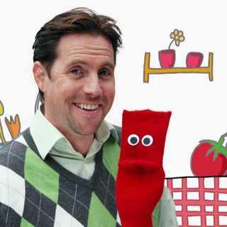 Englisch lernen: Socke Red und David, dazu Schriftzug "David and Red"